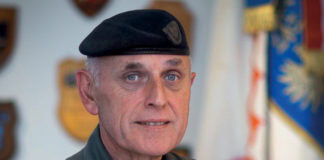 Head of foreign operations Colonel Amon in conversation