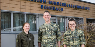 Three information officers in conversation