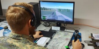 Professional soldiers train on the combat simulator