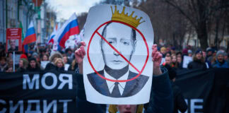 5 Sichten auf die Welt #003: Was war? Was ist? Was wird? Plakat mit dem Konterfei des russischen Präsidenten Wladimir PUtin – ©Valery Tenevoy auf Unsplash