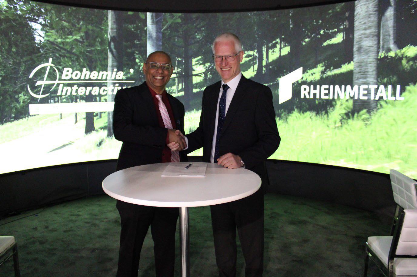 BISim-Präsident Rahul Thakkar (links) und Jens Jessenberger, Senior Vice President Vehicle Mission & Training Systems bei Rheinmetall Electronics – ©Rheinmetall BISim-Präsident Rahul Thakkar (links) und Jens Jessenberger, Senior Vice President Vehicle Mission & Training Systems bei Rheinmetall Electronics – ©Rheinmetall