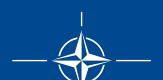 NATO women’s representative warns of new front The NATO flag. ©Wikipedia/Janitoalevic,Neil